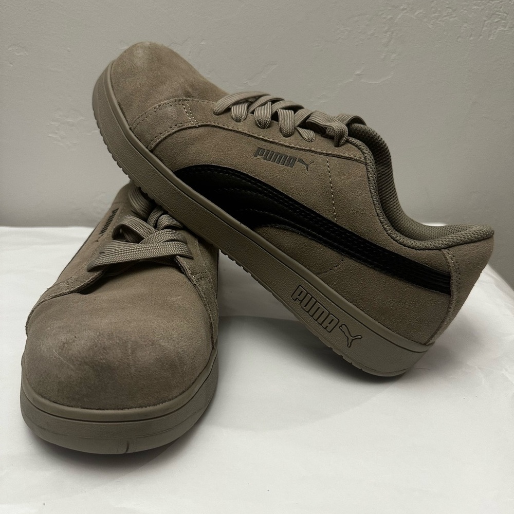 Puma Men's Taupe and Black Sneakers
B82